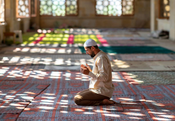 istock Muslim man praying in mosque 1176429360