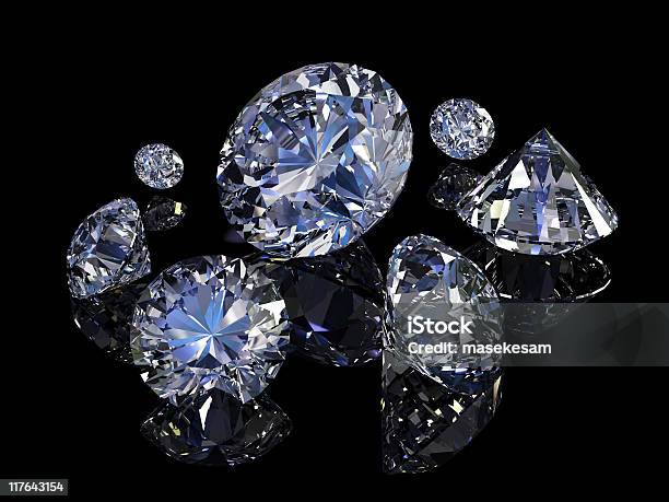 Closeup Of Seven Shiny Diamonds On Black Background Stock Photo - Download Image Now