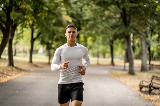 Young man jogging in the park