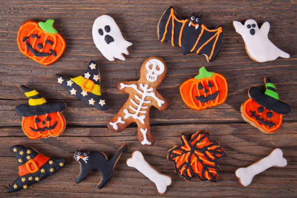 istock Halloween homemade gingerbread cookies on rustic wooden table 1176436453