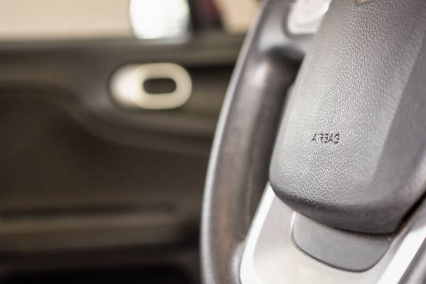 istock Safety airbag sign on car steering wheel 1176438598