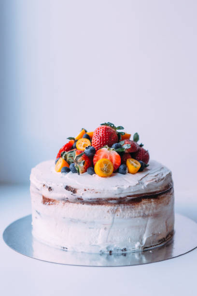 istock Cake with fresh berries, selective focus. the wedding cake. 1176438735