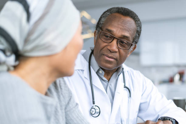 istock Physician consults cancer patient 1176438932