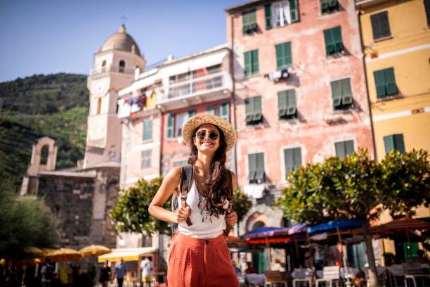 Happy smiling tourist visiting Italy. stock photo