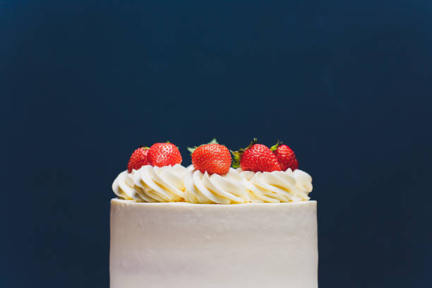 istock Cake decorated with isomalt shape and strawberries on blue background. 1176439864