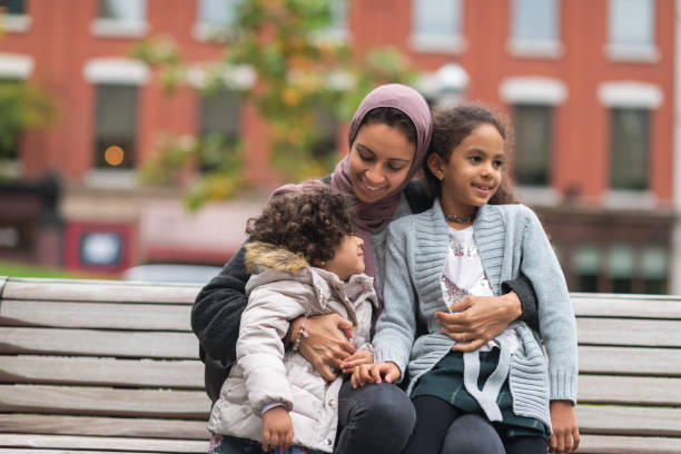 istock Muslim woman spending time with young daughters 1176440280