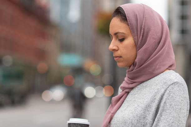 istock Contemplative Muslim woman 1176440330
