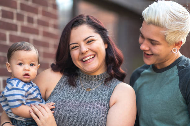 istock Lesbian couple with baby 1176440362