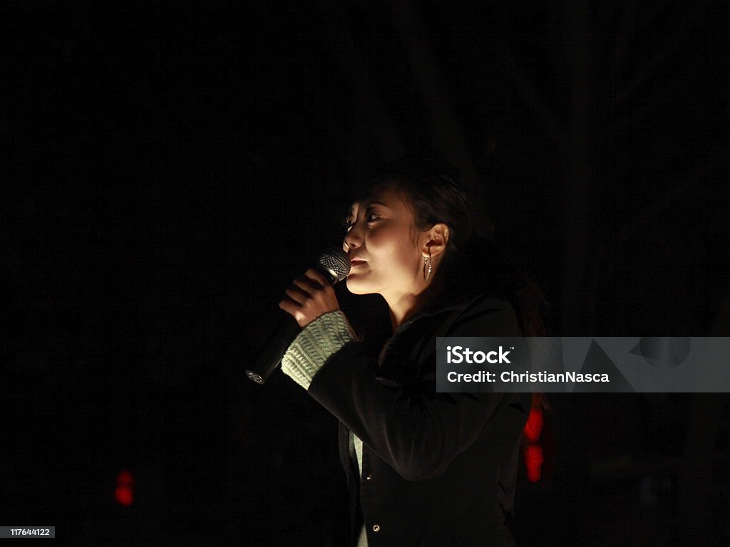 Asian singer  Spot Lit Stock Photo