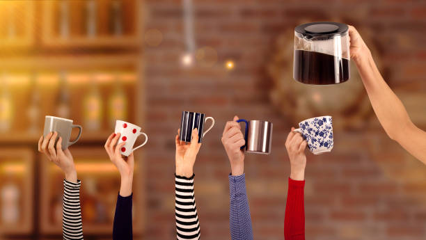 istock hands up and holding many coffee cups 1176441703