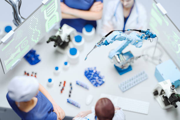 Modern laboratory with robotic arms Modern laboratory with robotic arms. This is entirely 3D generated image. All names, designations, strings and numbers, monitor/display images are my own work and made up. robotic arm lab stock pictures, royalty-free photos & images