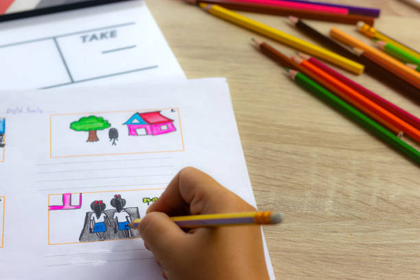 istock Storyboard drawing with pencil creative sketch cartoon. Storyboarding is process image displayed in sequence for purpose of pre-visualizing motion picture, interactive media. Concept sketching ideas. 1176452300