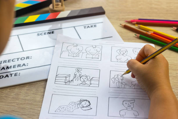 istock Storyboard drawing with pencil creative sketch cartoon. Storyboarding is process image displayed in sequence for purpose of pre-visualizing motion picture, interactive media. Concept sketching ideas. 1176452333