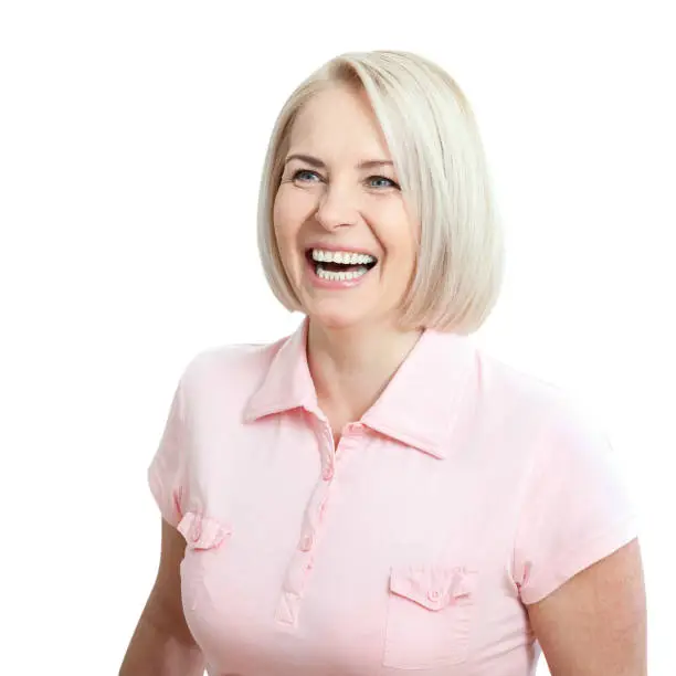 Photo of Friendly smiling middle-aged woman isolated on white background