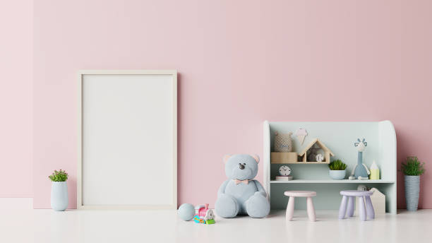 istock Mock up posters in child room interior on pink background. 1176455818