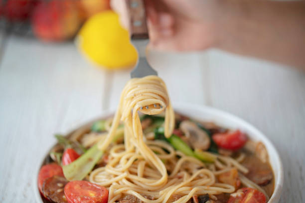 istock Homemade sausage and tomato spaghetti 1176459603