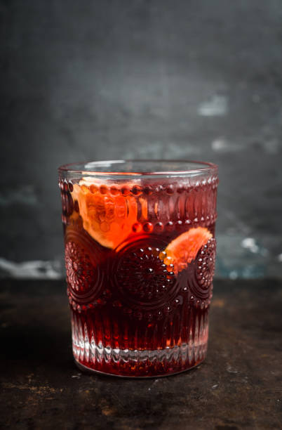 istock Old-fashioned cocktail with figs on the rustic background 1176461686