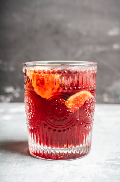 istock Old-fashioned cocktail with figs on the rustic background 1176461725
