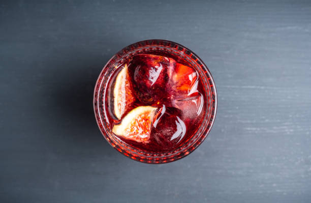 istock Old-fashioned cocktail with figs on the rustic background 1176461729
