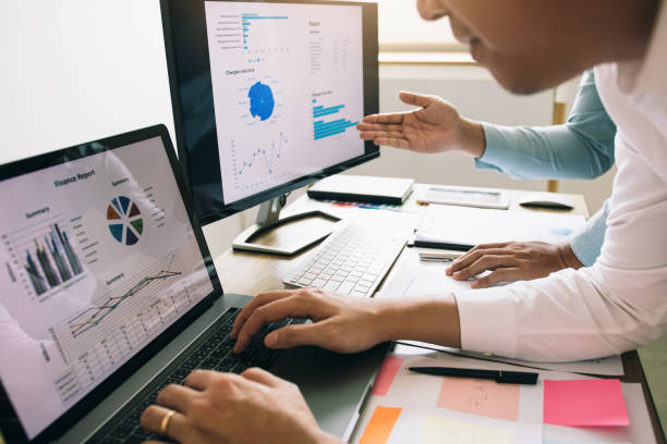 istock Two entrepreneur person working and colleague analyzing data for new start-up business and marketing. 1176464507