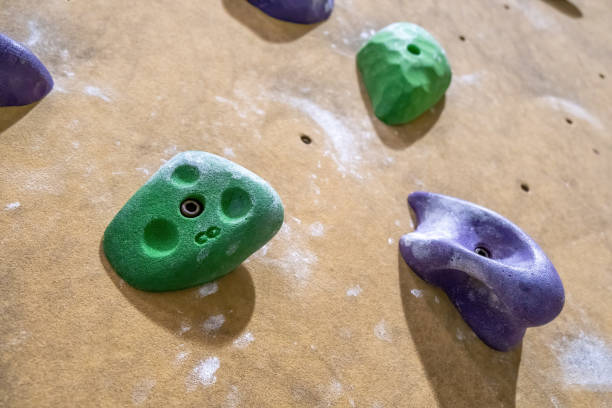 istock Climbing holds on wall gym closeup 1176465162