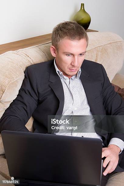 Young Man Relaxing With Laptop Stock Photo - Download Image Now - Adult, Adults Only, Beautiful People