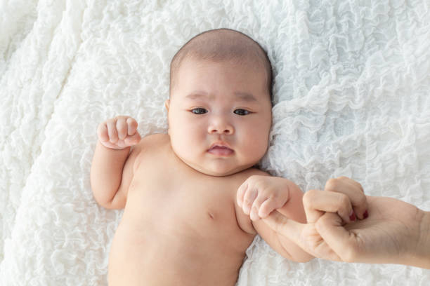 istock New born baby hand,selective focus 1176472216