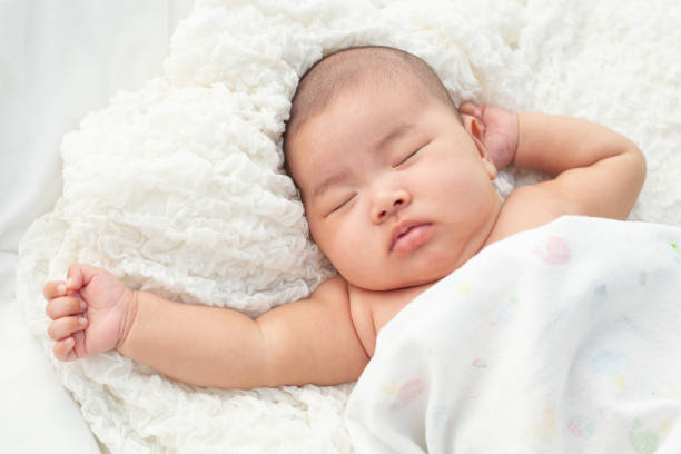 istock Baby lying on the bed 1176472337