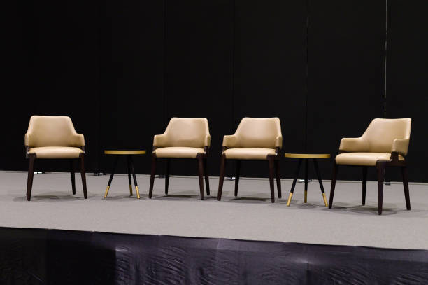 Empty chairs on stage ready for seminar stock photo