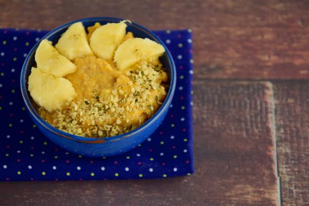 Pumpkin porridge with banana and hemp seeds