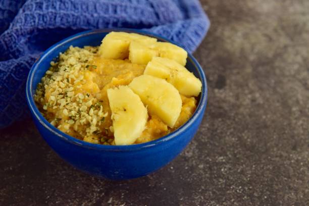 Pumpkin porridge with banana and hemp seeds