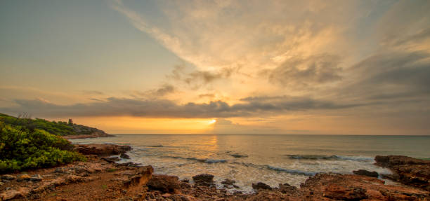 istock Cloudy sunrise on the coast of Oropesa del Mar 1176477939