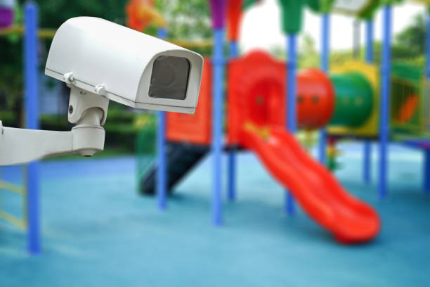 CCTV Closed circuit camera, TV monitoring at kindergarten school playground outdoor for kid children : security system concept. CCTV Closed circuit camera, TV monitoring at kindergarten school playground outdoor for kid children : security system concept. cctv in school stock pictures, royalty-free photos & images