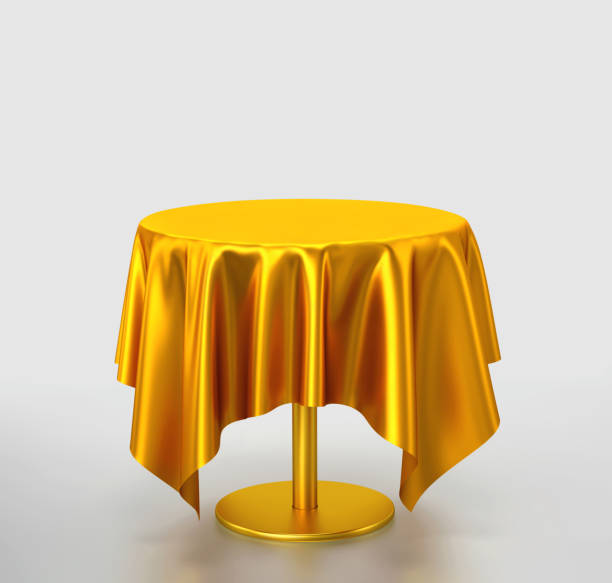 istock Golden table with tablecloth on gray background 1176485601