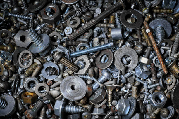 istock Abstract background with various screws, nuts, bolts and washers and other fasteners. Macro. 1176486760