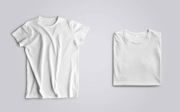 istock Unfolded and folded  blank t-shirt on a studio background. 1176486972