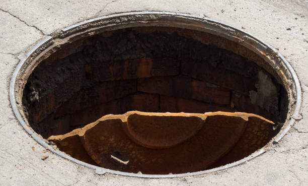 istock Outdoor sewer on the road, close-up, breaking 1176488371