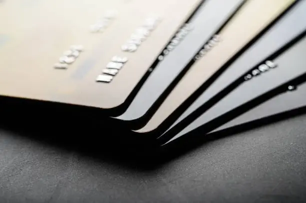 Photo of Credit cards that are stacked neatly together,selective focus