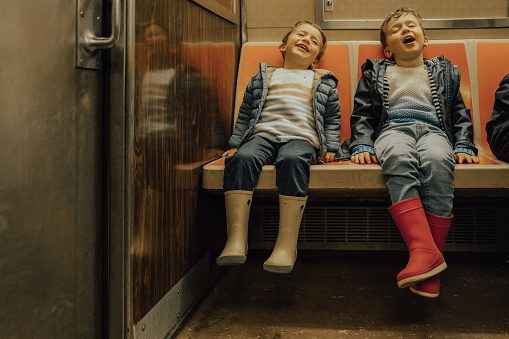 Boys taking the subway