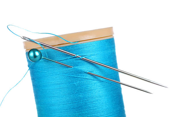 istock cotton reels ,needle and pins 117649457
