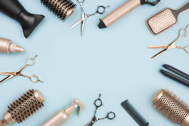 istock Hair cutting tools and accessories on blue background with space 1176496253
