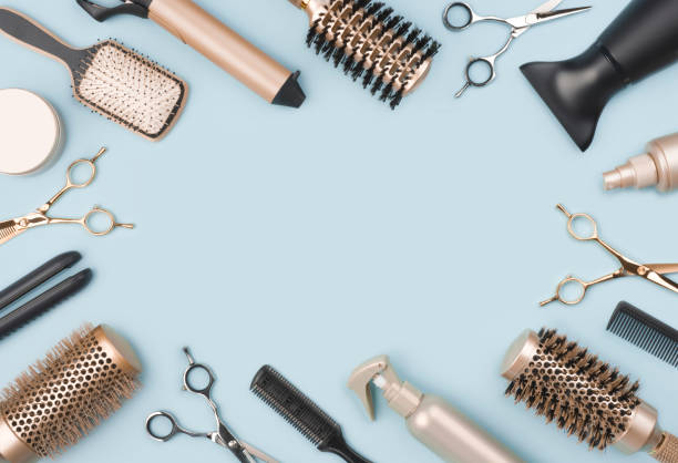 istock Professional hairdressing tools and accessories on blue background with space 1176496639