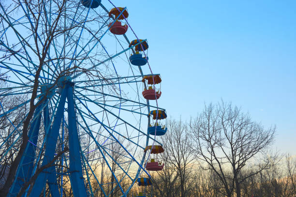 istock Old Ferris wheel at an amusement Park at sunset. 1176496834