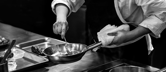 Chef cooking in a restaurant kitchen
