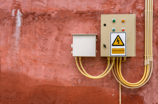 istock electronic board on the orange wall, electronic board  are installed from outside the building. 1176500867