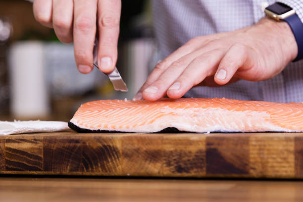istock Close up of preparing salmon in the kitchen. 1176501411