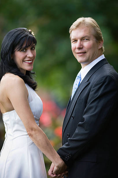 istock Young Bride and Groom Outdoors 117650645