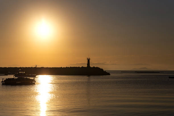 istock a beautiful scene of sunrise at a harbor. 1176506485