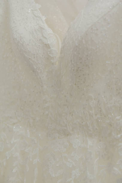 istock Beautiful wedding dresses in a bridal salon 1176508813