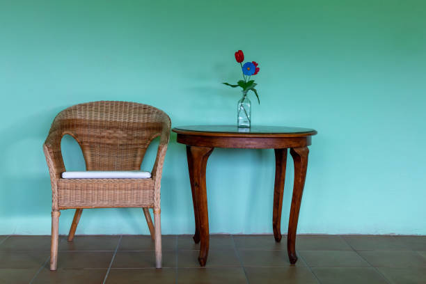 istock Old style decoration, chair, table and blue wall 1176509315